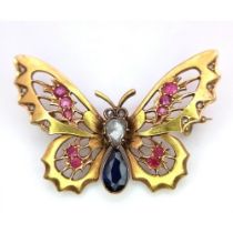 A Fabulous Victorian 18K Yellow Gold, Sapphire Diamond and Ruby Butterfly Brooch. An old-cut diamond