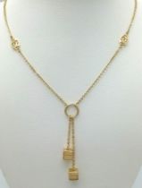 A 14K YELLOW GOLD CARTIER STYLE NECKLACE 9.2G 51cm chain, 4.8cm drop ref: SC 1057