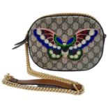 A Gucci GG Butterfly Design Crossbody Bag. Monogram canvas with brown leather surround.
