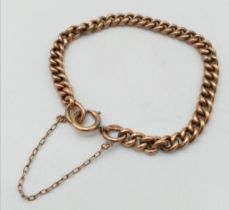 A vintage, 9 K rose gold chain bracelet with security chain. Clasp in good working order. weight: