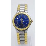 An Unworn Ladies Swiss Blue Face Bi-Metal Quartz Watch by Luciano. 34mm Including Crown. Replacement