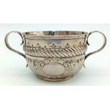 An Antique Georgian Sterling Silver Two-Handled Small Bowl. Chased and Repoussé decoration