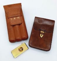 A Vintage Gentleman’s Leather Cigar Case, Leather Cigarette Case and Gold Tone Cigar Cutter.