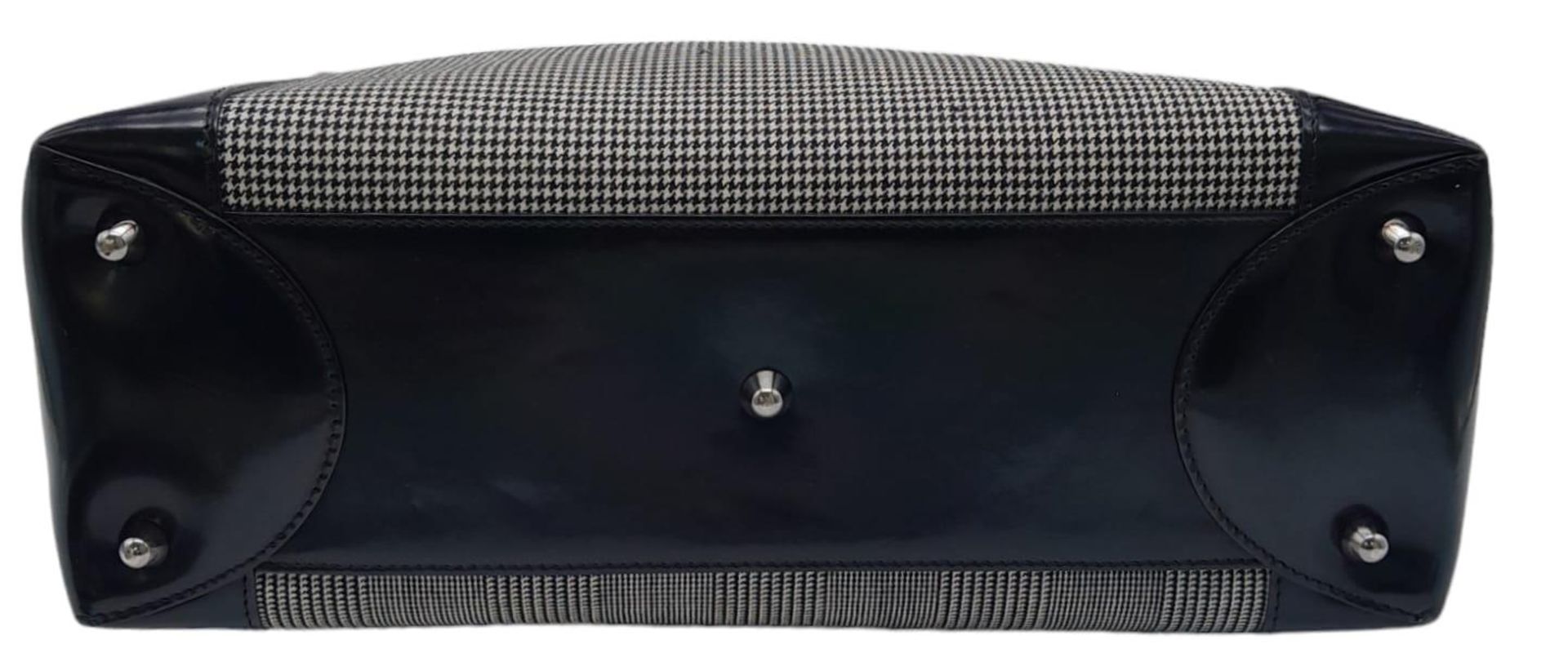 A Christian Dior - Lady Dior Bag. Canvas and black patent leather exterior. Silver tone hardware. - Image 4 of 9