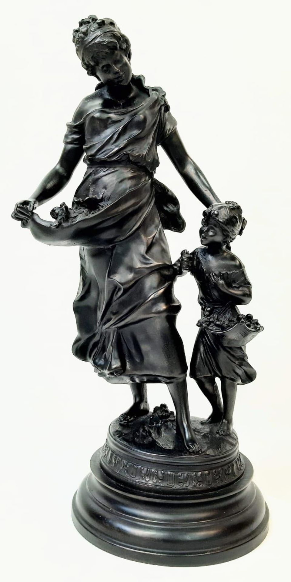 Charming, large statue depicting a Mother and a Daughter out collecting flowers. Standing 54cm tall,