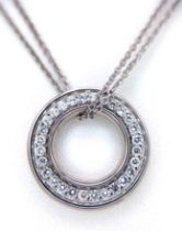 An 18K White Gold and Diamond Boodles Designer Roulette Pendant on an 18K Gold Boodles Designer