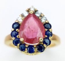 A 18K GOLD CENTRAL RUBY RING SURROUNDED BY DIAMONDS AND SAPPHIRES IN A DELIGHTFUL PEAR SHAPE .5.3gms