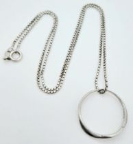 A Silver Ring and Roan Style Chain Combo.