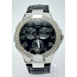 A Unisex Clear Stone Set Bezel Watch by Guess. 42mm Including Crown. Full Working Order. In