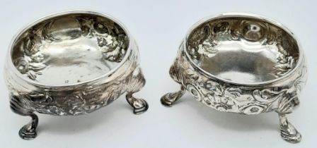 A Pair of Antique Sterling Cauldron-Shaped Sterling Silver Salt Pots. Chased floral decoration