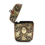 An antique metal vesta case with floral motif. Total weight 28.2G. 4.5 X 5.5cm.