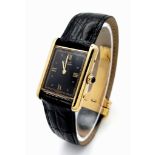 A Cartier, Must de Cartier Vermeil Quartz Ladies Watch. Black leather strap with Cartier buckle.