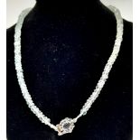 A 158ctw Aquamarine Necklace with Sapphire Clasp set in 925 Silver. 42cm length. 30.87g total
