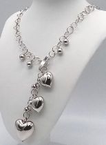 A sterling silver, necklace loaded with hearts. Total weight: 38.8 g. Perfect as a St valentine's
