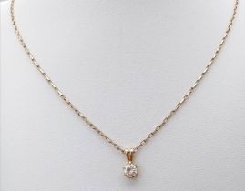 A 9K Yellow Gold White Zircon Pendant on a 9K Yellow Gold Link Necklace. 1cm and 44cm. 2.7g total