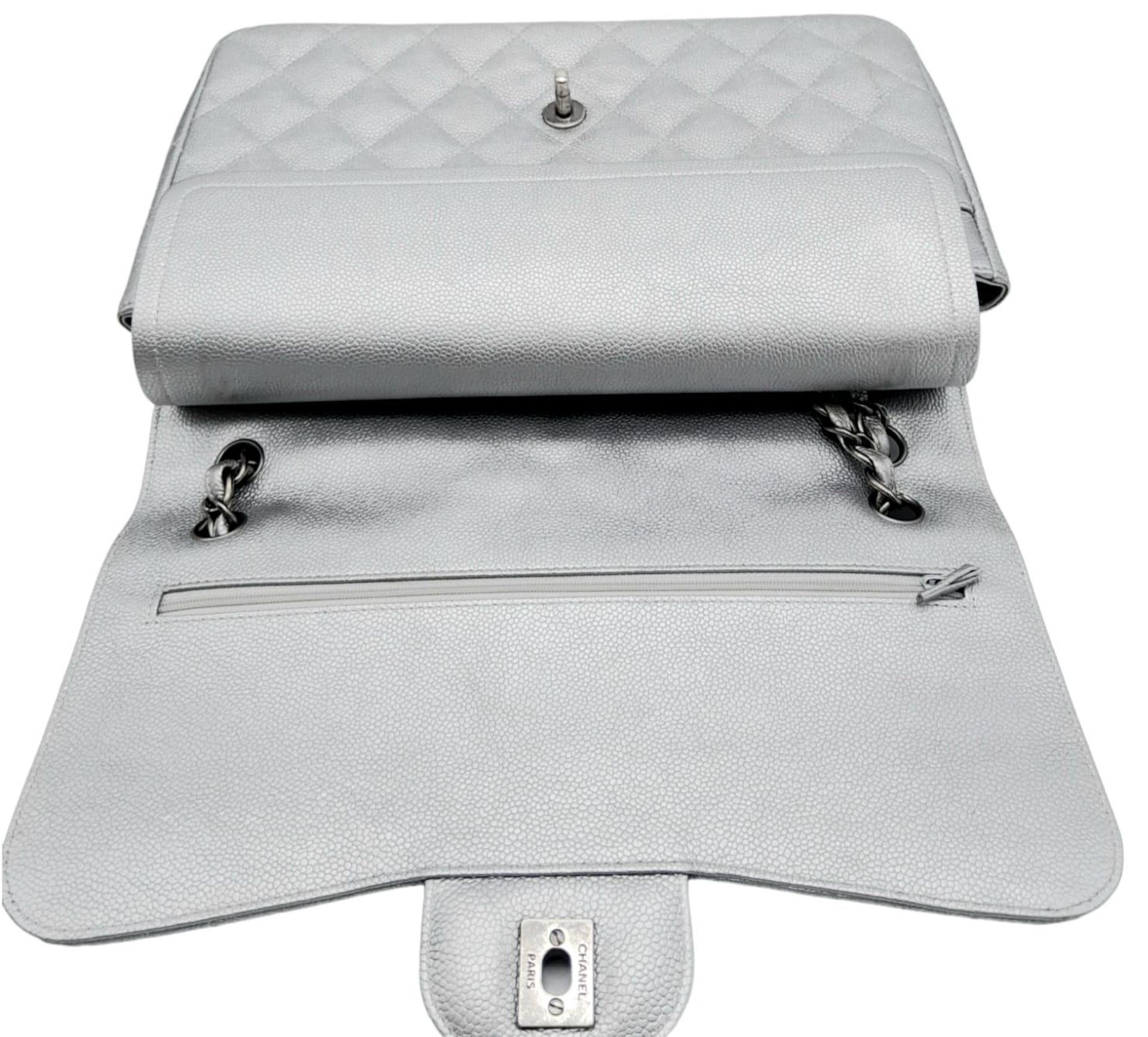 A Chanel Metallic Silver Double Flap Jumbo Bag. Quilted caviar leather. Silver tone hardware. Double - Image 7 of 12