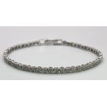 A 9K White Gold Diamond Bracelet. 19cm length, 1ctw, 7.7g total weight. Ref: SC1125