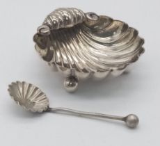 An Antique Silver Shell Shape Salt with a Corresponding Hallmarked 1887 Silver Spoon. Salt