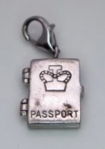 A THOMAS SABO sterling silver PASSPORT GLOBE TROTTER charm, weight: 4 g.