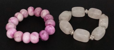 A Rose Quartz and a Pink Rhodochrosite Expandable Bracelet.