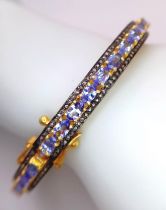 A Gorgeous Blue Tanzanite and Diamond Gemstone Bracelet set in Gold-Plated 925 Silver. A central row