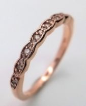 A 14K ROSE GOLD DIAMOND SET HALF ETERNITY BAND RING approx 2.06 SIZE N 1/2 ref: SC 1065