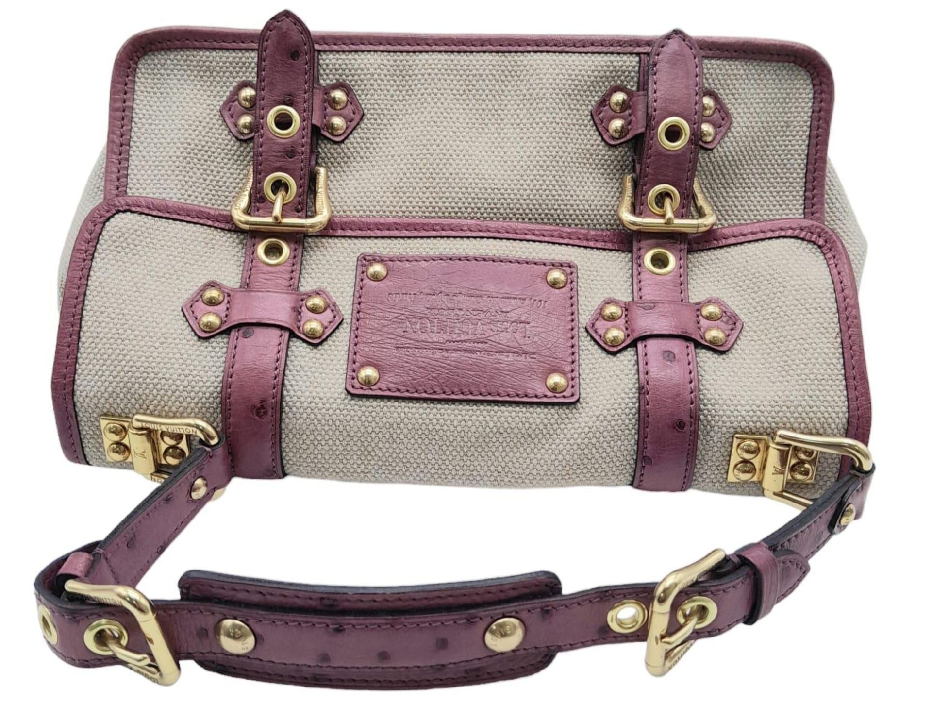 A LOUIS VUITTON PURPLE OSTRICH SAC EXPRESS GM PURSE LIMITED EDITION ONLY USED A COUPLE OF TIMES , IN - Image 4 of 8