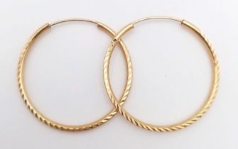 A Pair of 9K Yellow Gold Hoop Earrings. 1g weight.