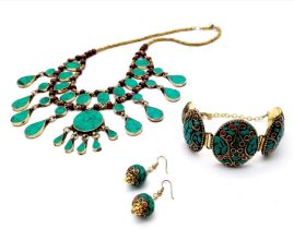 A Turquoise Jewellery Set Comprising of: Necklace, bracelet and earrings.