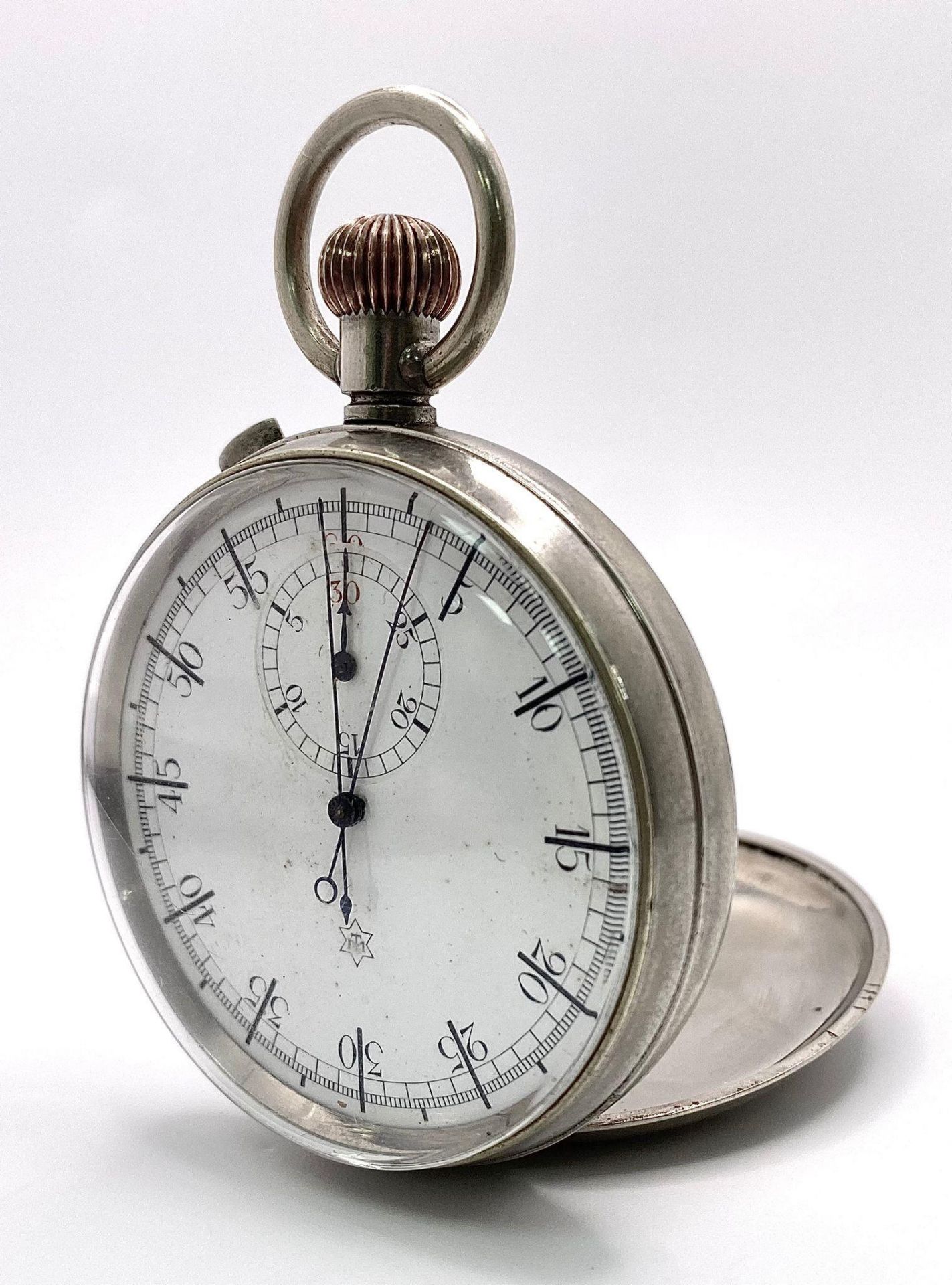 A Vintage White Metal Stopwatch. Mechanical top-winder. In working order. 53mm case. Ref: 15692