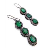 A Pair of Emerald and Diamond Gemstone Dangler Earrings set in 925 Silver. Emeralds - 14ctw (approx)