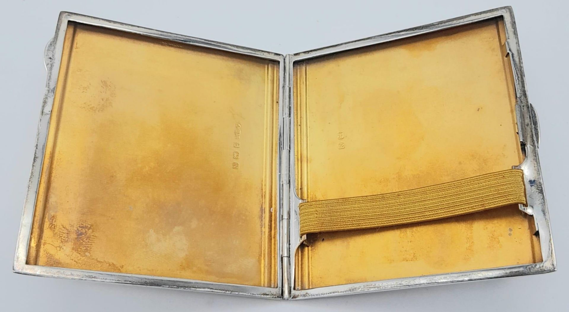 A Vintage Sterling Silver Cigarette Case. Machine tooled exterior decoration with a rich gilded - Image 4 of 6