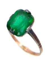 A vintage 9Ct gold gilded silver green stone solitaire ring. Total weight 1.75G. Size N.