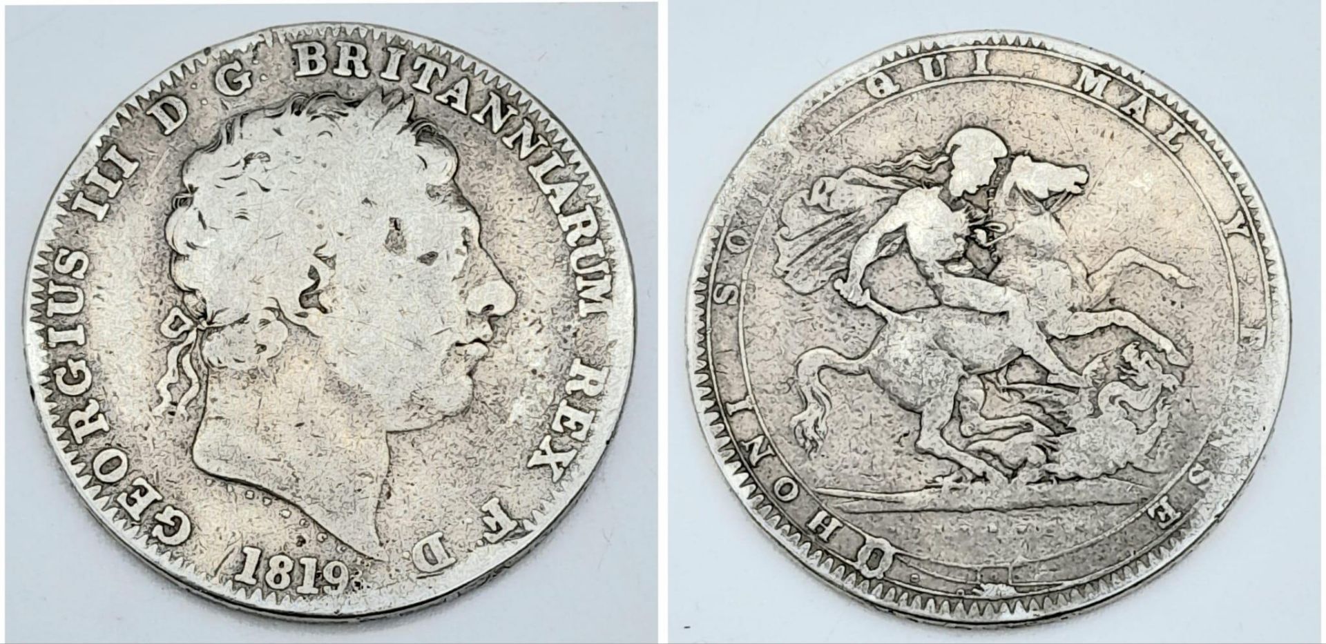 An 1819 George III Silver Crown - F grade but please see photos.
