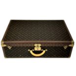 A Louis Vuitton Alzer 80 Monogram Large Sturdy Suitcase/Trunk. Monogram canvas and brown leather