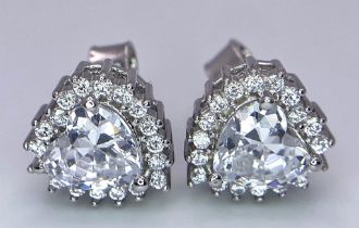 A Pair of Silver Cluster Stud Earrings - Set with heart-shaped CZ and a halo of CZ.