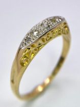 An Antique 18K Gold, Platinum and Five Stone Diamond Ring. Size K. 1.6g total weight.