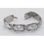 A Stunning Swarovski Rhodium Plated ‘Nirvana-model 1166714’ Crystal Bracelet. 19.5cm Length, 1.8cm