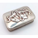A Vintage Pin/Pill Silver Box with a Pair of Ornate Decorative Theatre Masks on Lid. 4 x 2.5cm.