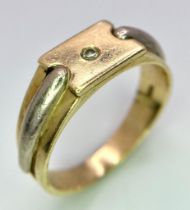 A 14 k yellow and white gold, stone set ring, size: T1/2, weight: 6.8 g.