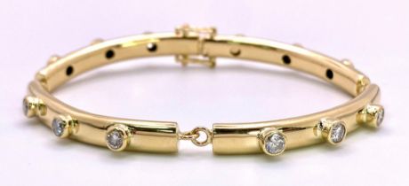 An 18K Yellow Gold (Tested) Diamond Bar Tennis Bracelet. 1.2ctw of bright round cut diamonds.