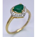 A 14K Gold Heart Shaped Emerald Gemstone Ring - with 0.18ctw of Diamond Accents. Emerald - 0.75ct.