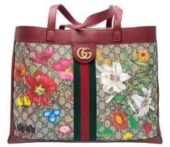 A Gucci Ophidia GG Floral Tote Bag with Matching Clutch Bag. Gucci monogram floral design exteriors.