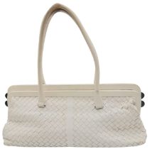 A Bottega Veneta Off White Intrecciato Leather Bag. Soft diamond cut leather exterior. Plush textile