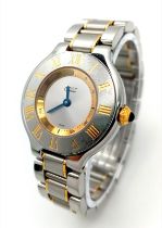 A Cartier 21 Must De Cartier Bi-Metal Ladies Watch. Gold and stainless steel bracelet and case -