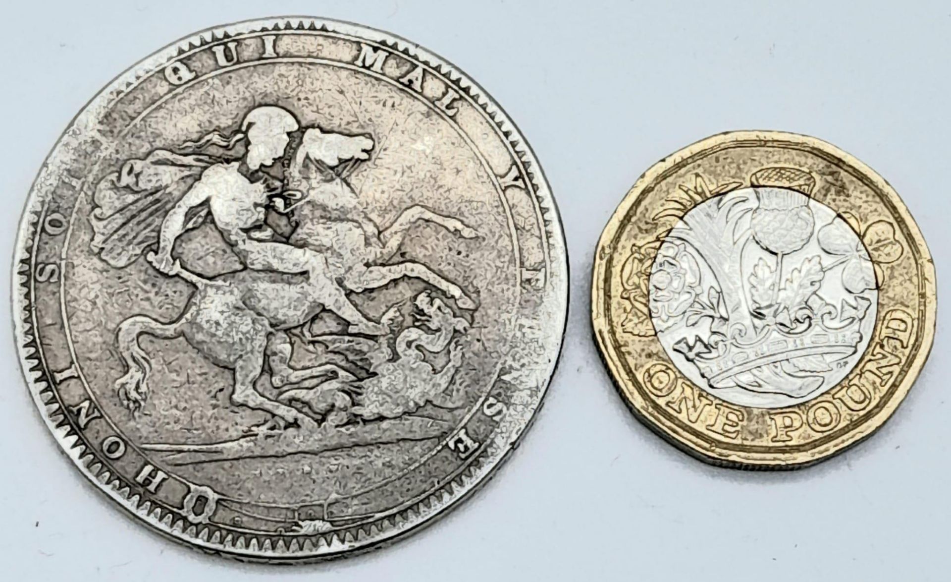 An 1819 George III Silver Crown - F grade but please see photos. - Image 2 of 3