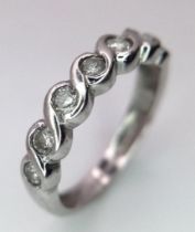 A 9K WHITE GOLD 0.30CT DIAMOND RING. TOTAL WEIGHT 2.3G. SIZE L