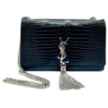 A YSL St. Laurent Hand/Shoulder Bag. Black croc-effect leather exterior with silver-tone hardware.