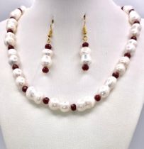 A rare and very collectable necklace and matching earrings set with totally natural, large (up to 20