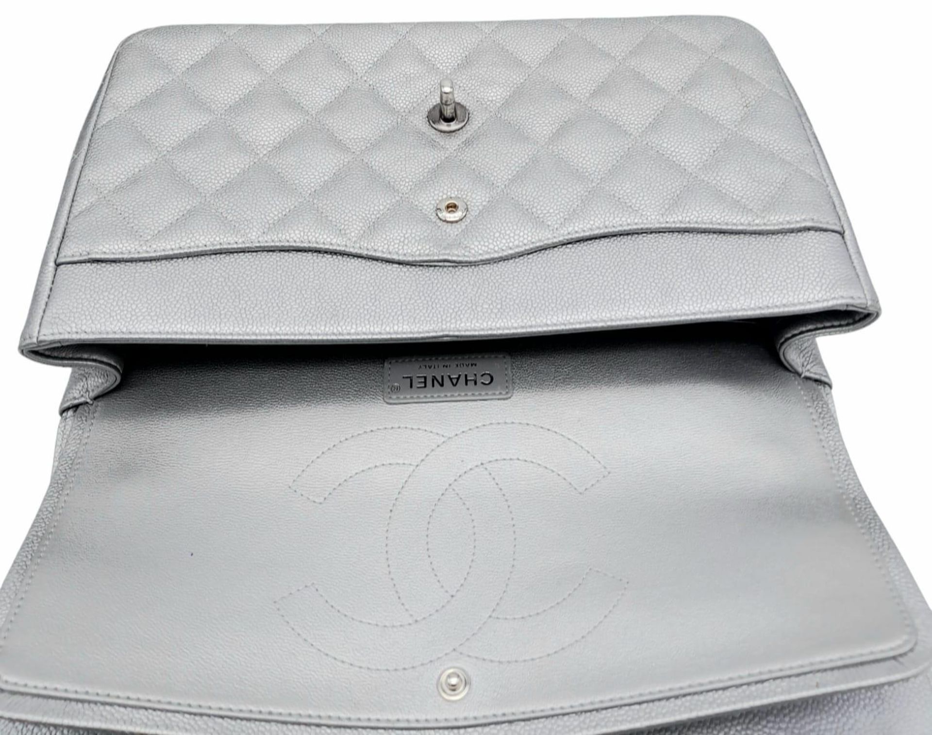 A Chanel Metallic Silver Double Flap Jumbo Bag. Quilted caviar leather. Silver tone hardware. Double - Image 8 of 12